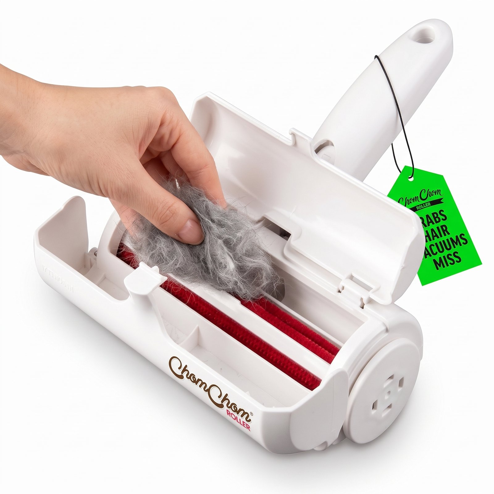 ChomChom Roller reusable pet hair remover removing cat fur from a fabric sofa.
